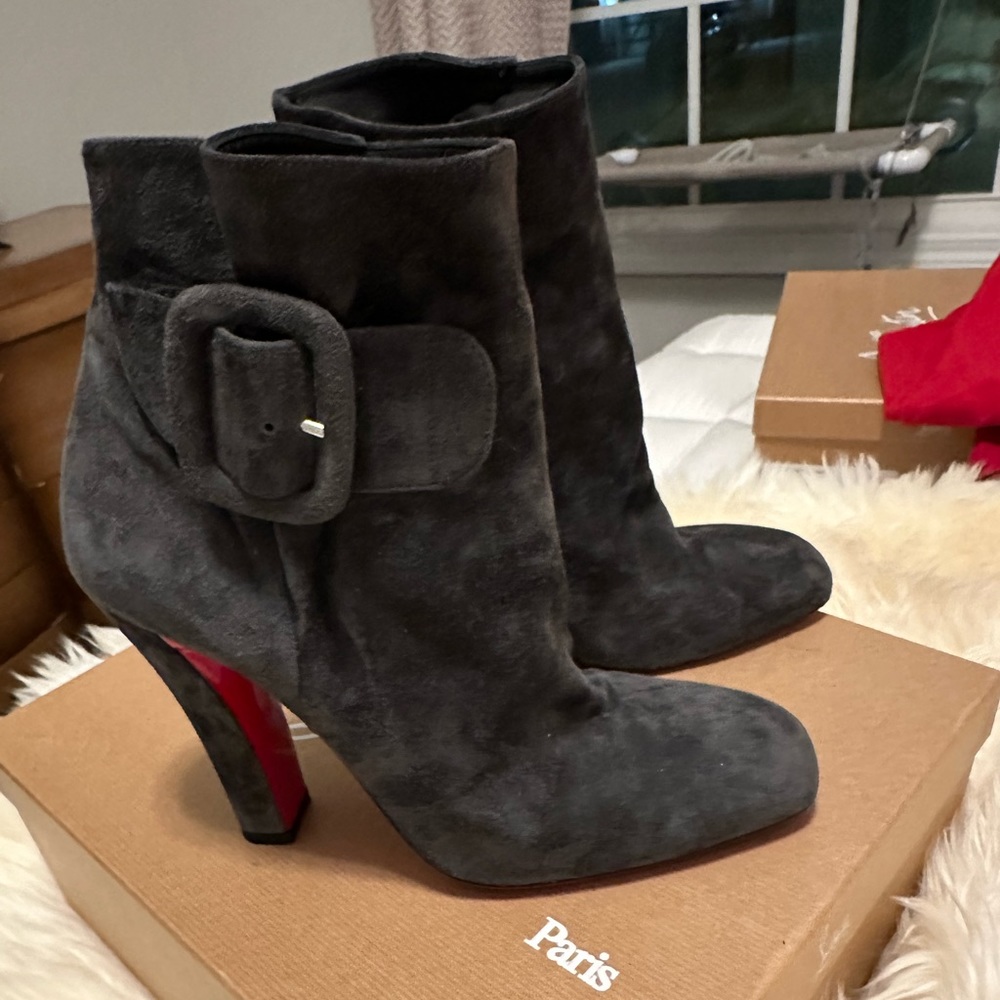 Christian Louboutin gray suede ankle booties with buckle.